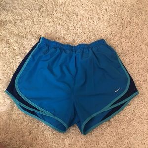 BLUE NIKE DRI-FIT RUNNING SHORTS